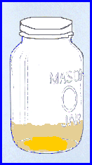 Jar with garlic paste and oil